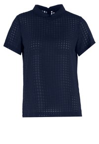 Marinblå kortärmad blus med ett texturerat rutmönster, med krage och ett nyckelhålsgärde bak. Lätt tyg.