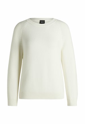 Maglione bianco a maglia con scollo rotondo, polsini e orlo a coste. Presenta un motivo texturizzato e maniche raglan.