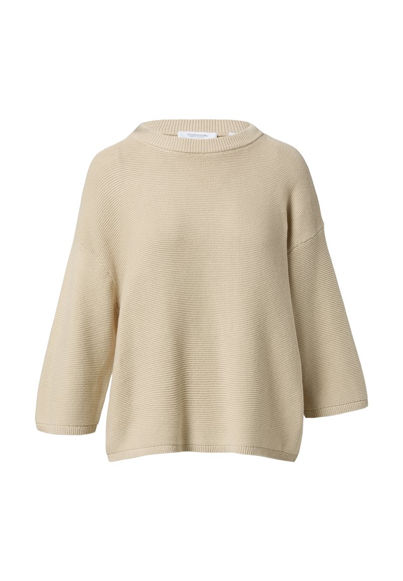 Cream-colored knitted sweater, loose fit, wide sleeves, crew neck, ribbed texture, and finished edges with a subtle horizontal pattern.