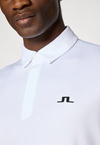 J.LINDEBERG Sports PEAT - Polo krekls - white