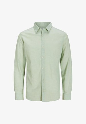 Šviesiai žalia ilgarankovė marškinėliai su smailiu apykakle, priekyje mygtukai ir tekstūruota medžiaga vizualiam įdomumui. Paprastas dizainas, minimalūs akcentai.