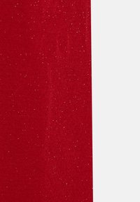 Red fabric with a smooth texture, featuring a subtle sparkle effect throughout. The pattern is uniform with evenly distributed, small glitter accents.