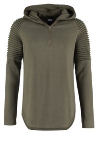 Olivgrön hoodtröja med dragkedja i halsen, med texturerade sidopaneler och långa ärmar. Sömmen är böjd för en modern silhuett.