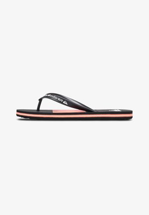 Black flip-flop with textured footbed, orange accents, and a logo on the strap. Features a slim, ergonomic design for comfort.