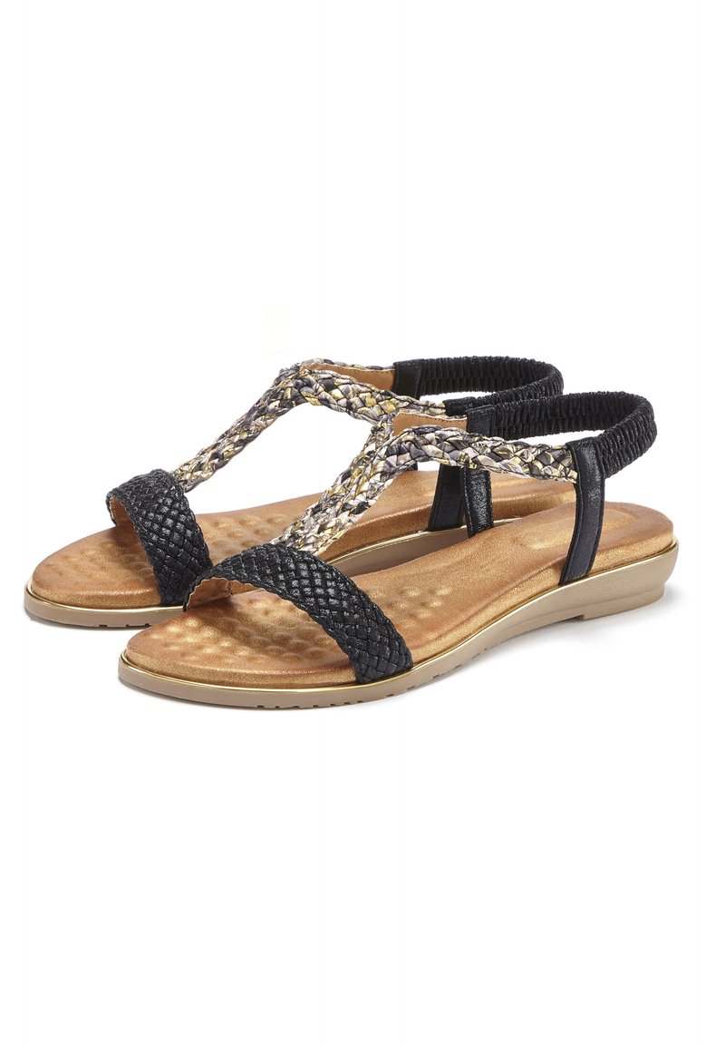 Schwarze geflochtene Sandalen mit einem strukturierten Riemendesign und einem gepolsterten Fußbett in Goldoptik. Mit verstellbaren Fesselriemen und einem niedrigen Absatz.