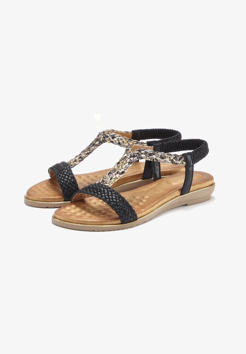 Schwarze geflochtene Sandalen mit einem strukturierten Riemendesign und einem gepolsterten Fußbett in Goldoptik. Mit verstellbaren Fesselriemen und einem niedrigen Absatz.