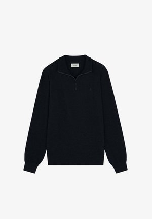 Un sweat zippé noir en matériau doux, avec un col, des manches longues et un détail de logo discret sur la poitrine.