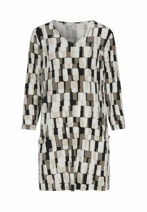 Langærmet tunika-kjole med beige, hvide, grå og sorte uregelmæssige rektangulære mønstre, V-hals og lommer på hvid baggrund.