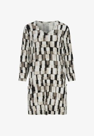 Tuniekjurk met lange mouwen met een beige, wit, grijs en zwart onregelmatig rechthoekig patroon, V-hals en zakken op een witte achtergrond.