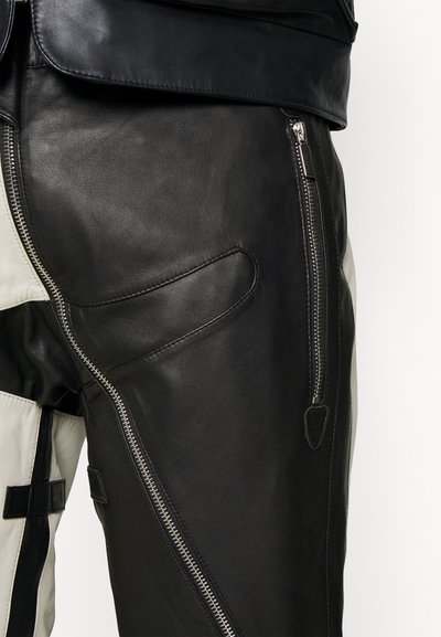 STUDIO ID ANTOINE BIKER TROUSERS - Usnjene hlače - black/red/off white