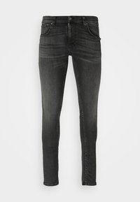Svarta skinny jeans med tvättad finish, fem fickor och stängning med metallknapp. Har kontrastsömmar och en slim passform.