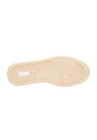 Suola di una sneaker, in gomma beige con motivi testurizzati, inclusi disegni circolari e lineari, con un accento rettangolare piatto.