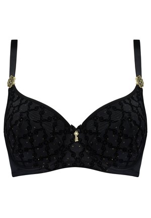 Soutien-gorge noir avec superposition de dentelle, présentant un motif et des accents dorés. Soutien-gorge avec armatures, bretelles ajustables et un petit détail clé central.