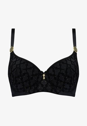Soutien-gorge noir avec superposition de dentelle, présentant un motif et des accents dorés. Soutien-gorge avec armatures, bretelles ajustables et un petit détail clé central.