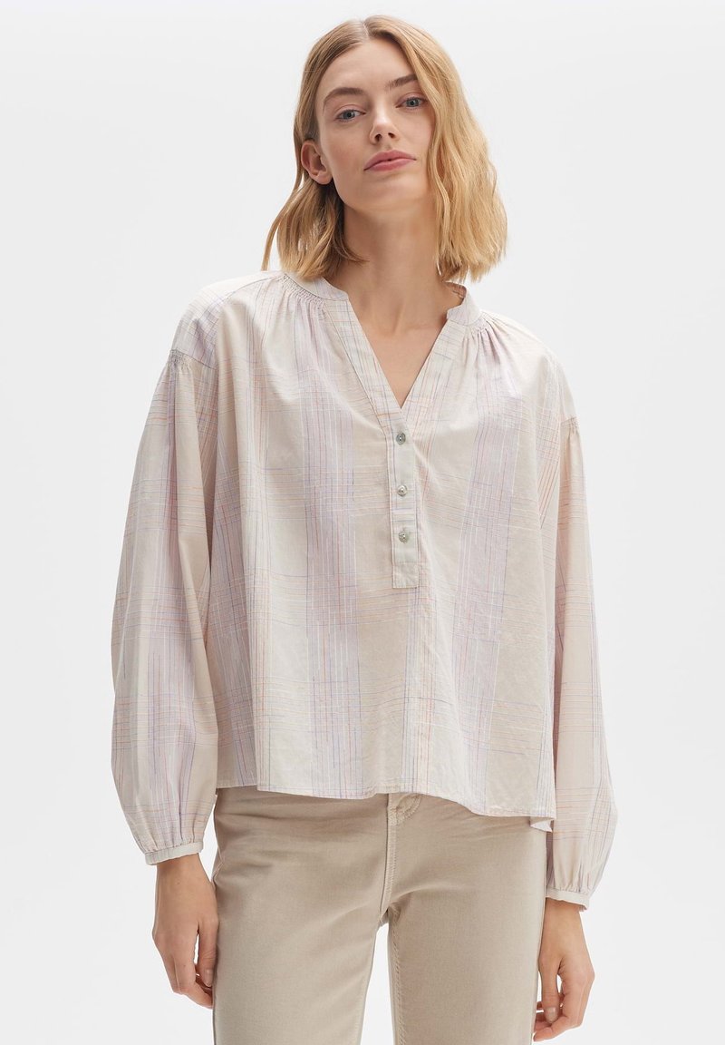 Camicia leggera a scacchi con scollo a V, maniche lunghe e chiusura con bottoni, caratterizzata da colori pastello e una vestibilità comoda. Tessuto liscio e tessuto.
