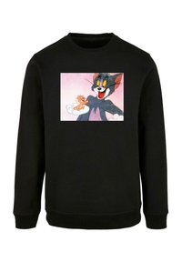 Black sweatshirt featuring a front graphic of a cartoon cat and mouse on a light pink background, with ribbed cuffs and neckline.
