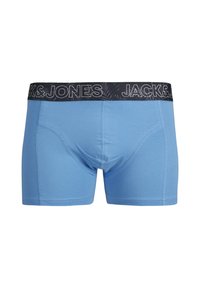 Blauwe katoenen boxershorts met een zwarte tailleband waarop de merknaam "JACK & JONES" in witte letters is gedrukt, versierd met accenten van palmbladeren.