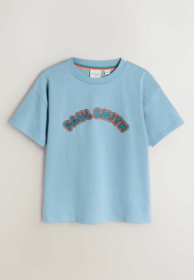 T-shirt en coton bleu clair à manches courtes, avec un motif de texte "Paul Smith" multicolore en arc sur le devant.