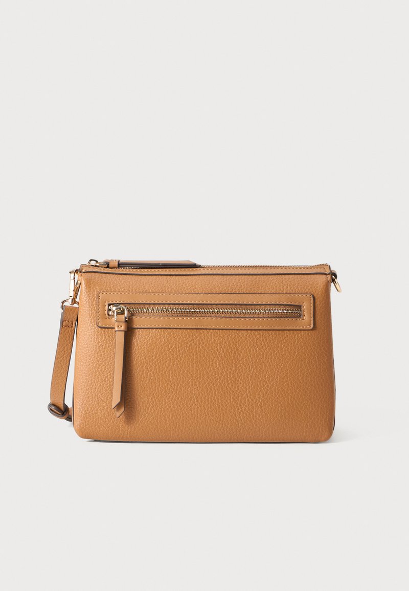 Tan leather crossbody bag with a pebbled texture, features a main zip compartment and a front zip pocket, includes a detachable strap.
