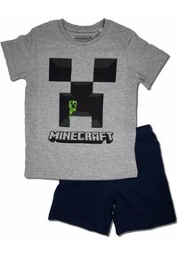 Gray cotton t-shirt with black pixelated creeper graphic and "MINECRAFT" text; paired with navy blue shorts.