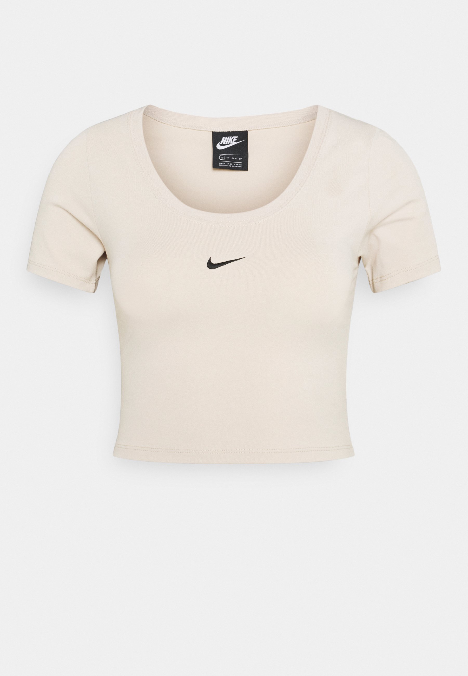 beige nike crop top