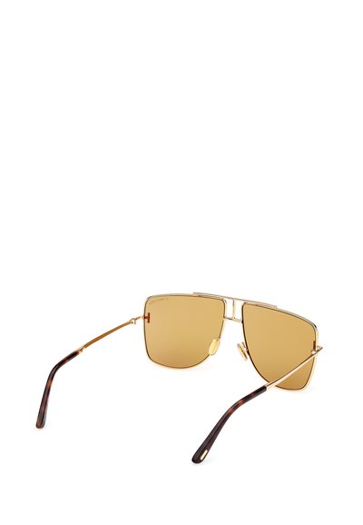 Guldmetallsolglasögon med fyrkantiga bruna linser, tunn guldram och sköldpaddsmönstrade skalmar. Har en unik ögonbrynsbåge och justerbara näskuddar.