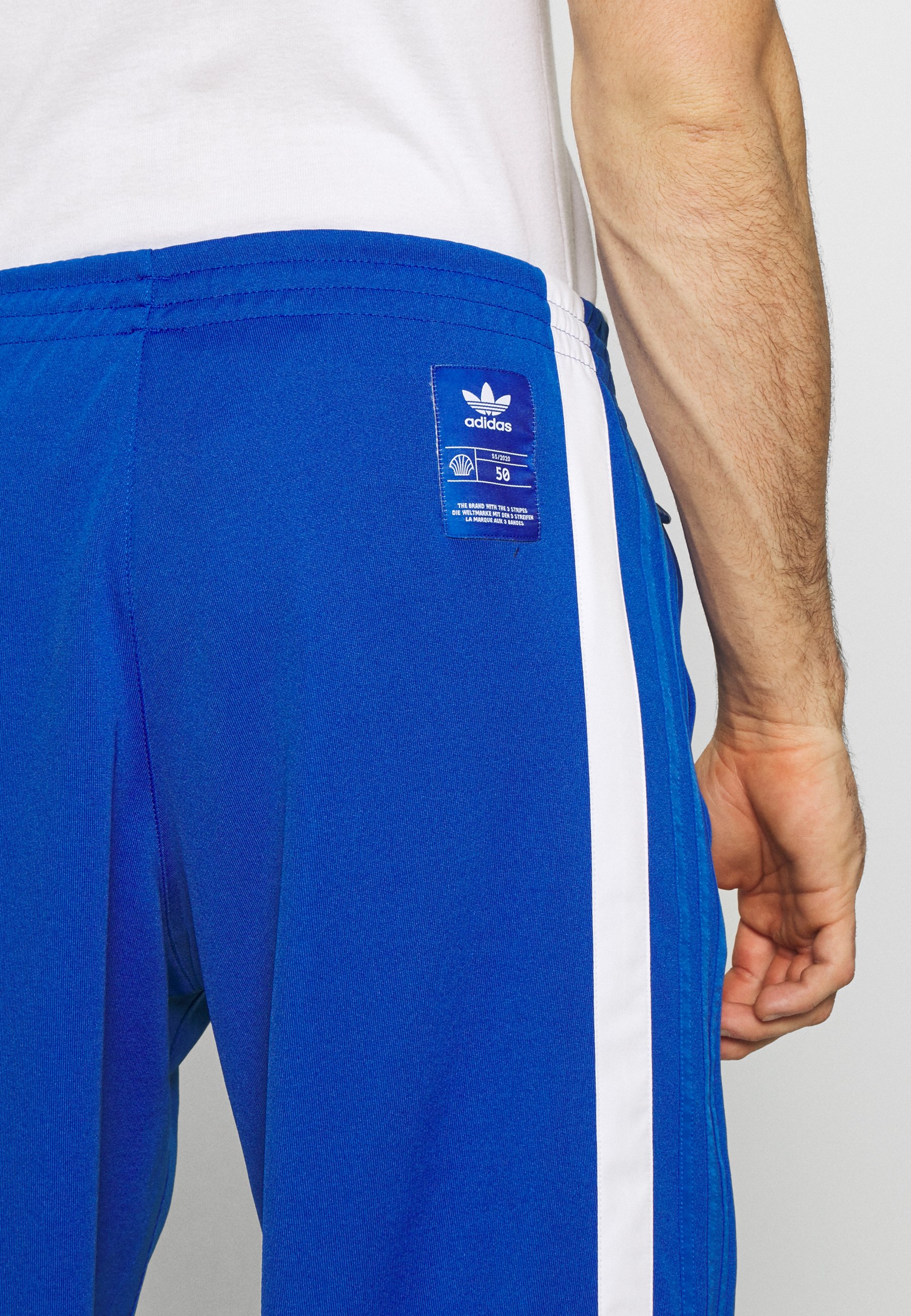 adidas Originals WARMUP Jogginghose bluewhite Zalando.at adidas Originals WARMUP Jogginghose bluewhite Zalando.at