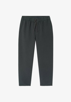 Tamsiai pilki kasdieniai džinsai su elastinga liemene ir raišteliu, tiesaus kirpimo, išdėstyti ant balto fono.