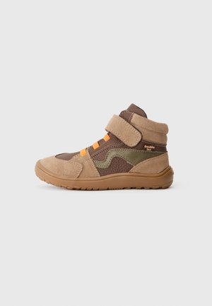 Brown and tan high-top shoes made of suede and leather, featuring orange laces, velcro strap, and textured patterns on the sides.