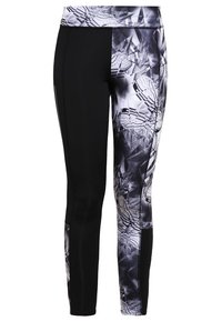 Zwarte en gemusterde sportleggings met een geometrisch ontwerp in grijstinten en wit, een gladde textuur en een aansluitende stijl.