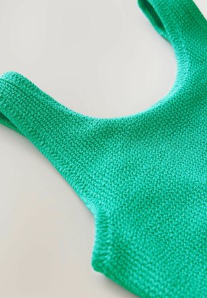 Groen gebreid tanktop met brede schouderbanden, een gestructureerde oppervlakte en een ronde halslijn. Zacht, ademend materiaal, ideaal voor casual kleding.