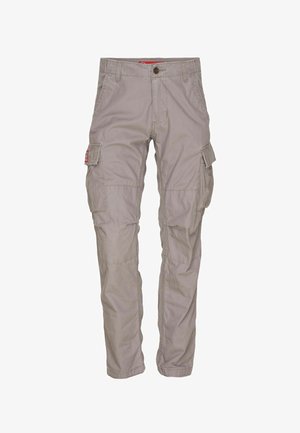 Gaiši beigetās kravas bikses, izgatavotas no kokvilnas auduma maisījuma. Tām ir vairākas sānu kabatas, taisna kāju konstrukcija un pogu aizdare.