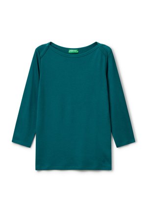 Tyrkysové tričko s dlouhým rukávem a crewneck výstřihem, s malým logem blízko dolního lemu na pravé straně.