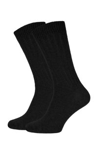 Schwarze Baumwollsocken mit gerippter Textur, verstärkter Zehen- und Fersenbereich. Knielange Ausführung mit elastischem, glattem Abschluss.