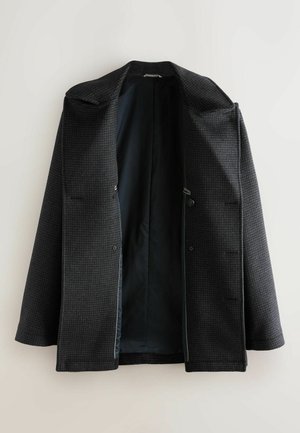 Dark gray houndstooth men's coat with black lining, open front, and notch lapel cuffs, displayed on a white background.