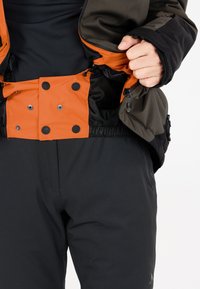 Whistler Skijacke - grijs oranje