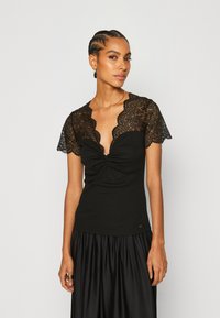 Morgan DENNY - Print T-shirt - noir