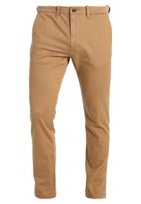 Khaki chinos vyrobené z směsového materiálu bavlny, s rovnými nohavicemi, zapínáním na zip, předními kapsami a jednou zadní kapsou.