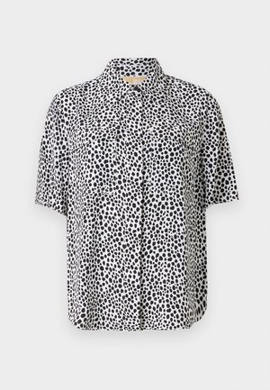 Camicia a maniche corte in tessuto leggero, con un motivo di pois neri su sfondo bianco, dotata di due tasche frontali e colletto.