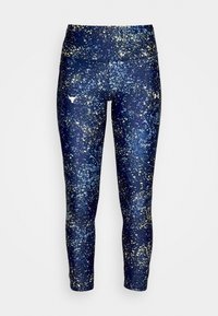 Navyblauwe leggings met een gespikkeld patroon in wit en geel, met een hoge tailleband en kleine witte logo's op de voorkant van de dijen.