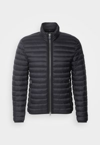 Veste matelassée légère noire avec fermeture éclair intégrale à l'avant, col montant et poches latérales zippées.