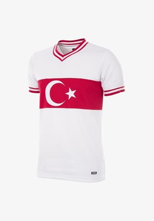 White jersey with a red horizontal stripe featuring a crescent moon and star. V-neck design with red striped accents on sleeves.