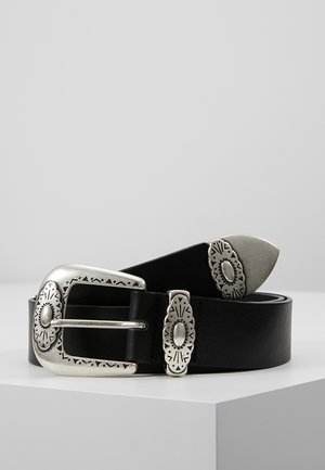 Black leather belt with silver engraved metal buckle, loop, and tip, displayed rolled on a white surface with a plain gray background.