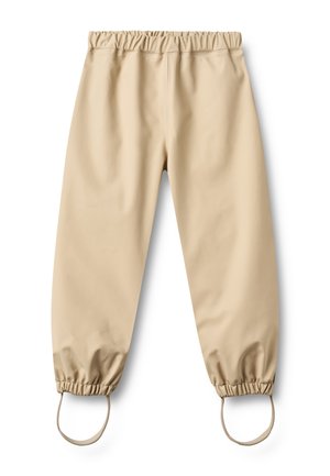 Beige vanntette bukser med elastisk midje og ankelmansjetter med fotstropper, designet for utendørs bruk eller beskyttelse mot regnvær.