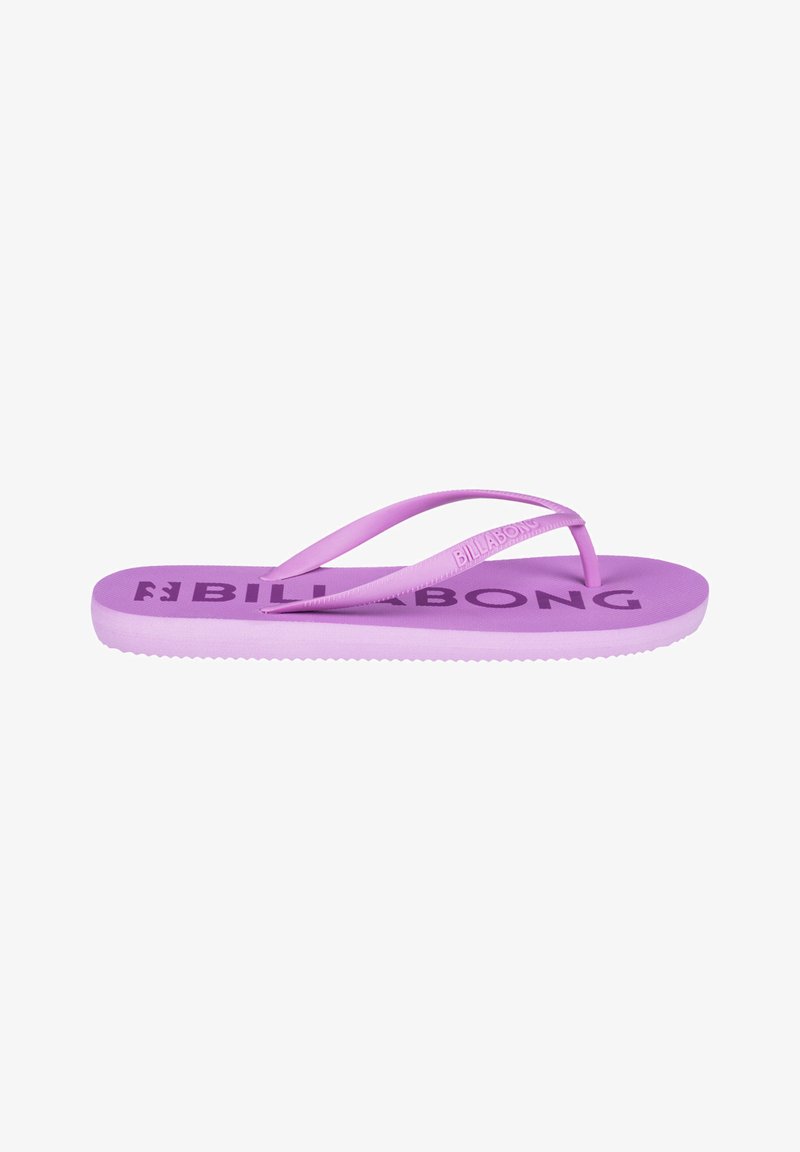 Purple flip-flop with a textured rubber sole and narrow straps. "BILLABONG" logo printed on the footbed. Flat and minimalistic design.