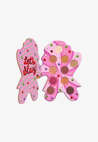 Paleta cieni do powiek w zabawnym kształcie ciasteczka. Posiada różowe, paskowane opakowanie oraz 10 odcieni o różnych wykończeniach i kolorach.