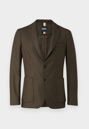 Bruine wollen blazer met een enkelknoopsluiting, met een geknipte revers, twee voorzakken en bruine knopen. Heeft een paspelzak op de borst.