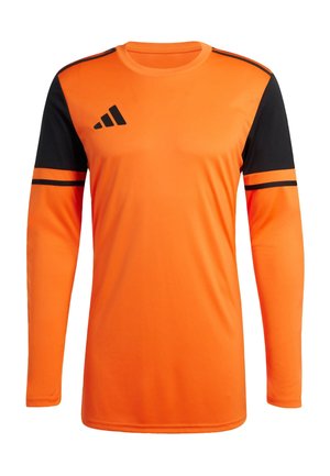 Oranje overhemd met lange mouwen en zwarte accenten. Heeft zwarte strepen op de mouwen en een zwart logo. Gemaakt van een gladde, lichtgewicht stof.
