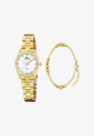 Zegarek na rękę z kwarcowym mechanizmem w złotym odcieniu, z tarczą z masy perłowej, okrągłą kopertą, akcentami z diamentów oraz bransoletką z ogniw. Do kompletu dołączona złota bransoletka z koralikami.