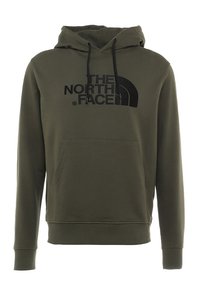 Sudadera verde de algodón con un bolsillo canguro, puños acanalados y un logo negro. Incluye cordones en la capucha.